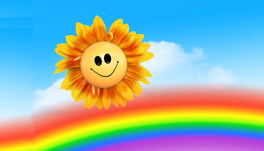 rainbow with a smiley sun-flower face